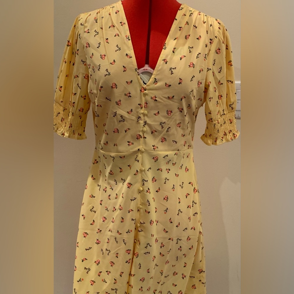 Yellow floral dress.